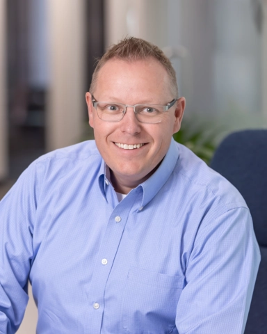 portrait of a smiling person in business attire